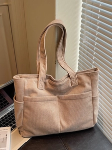 Grand sac cabas en velours côtelé kaki avec poches avant pour les trajets quotidiens