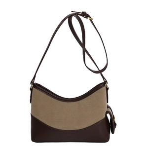 Vintage suede patchwork hobo bag with adjustable strap and small charm in brown