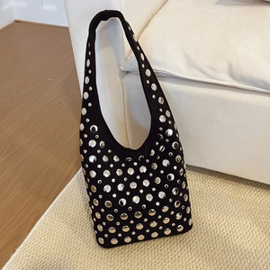 Gothic punk black suede bucket bag with silver rivet studs and a wide shoulder strap