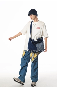 Street style outfit featuring a large denim patchwork crossbody bag for women