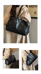 Detail of black large-capacity tote bag showing PU leather texture and silver metal rings