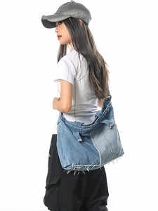 Retro denim patchwork crossbody bag with frayed edges and large capacity for daily use