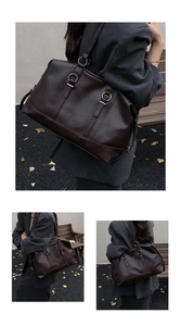 Detail of deep brown PU leather tote bag with silver ring hardware and sturdy strap