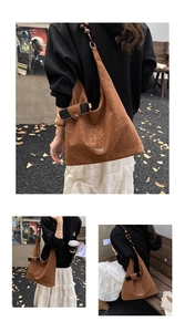 Detail of suede leopard print tote bag featuring decorative dark brown wooden beads