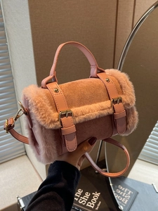 Pink plush patchwork boston bag with vintage metal buckles and leather crossbody strap