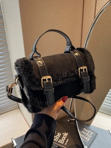 Chic black plush shoulder bag with faux fur trim and gold hardware for autumn winter fashion