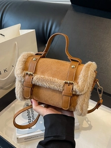 Camel faux fur trim shoulder bag with buckle details and top handle for winter fashion