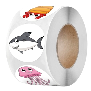 Roll of 500 cartoon sea animal reward stickers for kids featuring shark and crab designs