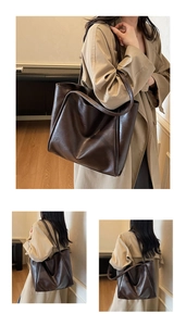 Detail of dark brown tote bag showing smooth leather texture and large capacity fit