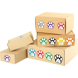 Colorful paw-shaped self-adhesive labels on kraft paper gift boxes for organization