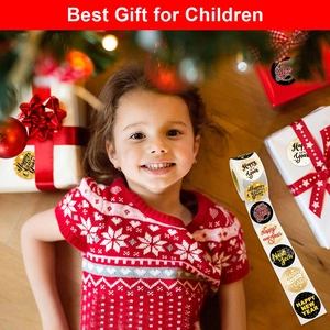 Roll of 1.5 inch Happy New Year decorative stickers with 8 festive patterns for gift sealing