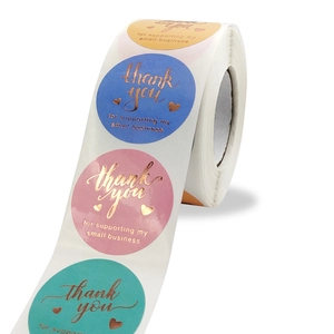 Roll of gold foil Thank You stickers in Morandi colors for small business packaging