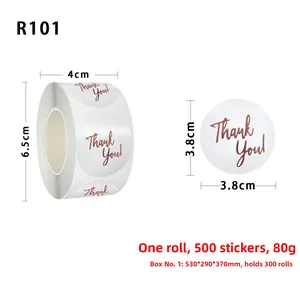 Macro shot of 3.8cm gold foil Thank You stickers roll for bakery packaging