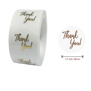 1.5 inch transparent gold foil Thank You stickers on a roll for gift packaging