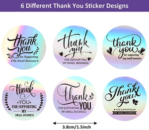 Macro detail of six holographic 1.5 inch circular thank you stickers with rainbow finish