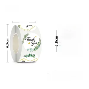 Detail of 3.8cm round floral thank you stickers with 500 adhesive labels per roll