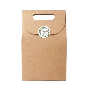 Brown kraft paper gift bag with a decorative floral Thank You sealing sticker