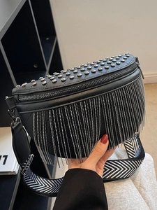 Black leather saddle bag with silver studs, fringe details and chevron strap