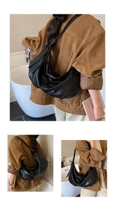 Detail of the soft black hobo bag showing its large capacity and supple leather texture