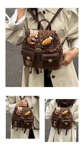 Detail showing vintage leopard print backpack with brown pockets and golden buckles