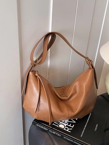 Brown vintage hobo shoulder bag in premium textured leather with zipper detail