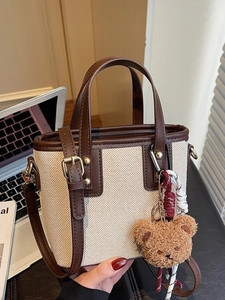 Contrast color canvas and brown leather crossbody bucket bag with cute bear charm