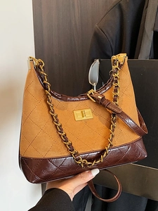 Vintage quilted chain hobo bag in brown suede and leather patchwork with gold clasp