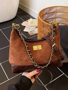Vintage brown quilted suede crossbody bag with gold chain strap and leather patchwork