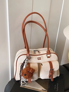 Retro canvas pillow bag in beige with brown leather trim and cute puppy charm