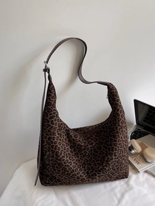 Chic leopard print tote bag with adjustable leather strap for large capacity storage