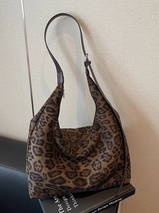 Large vintage leopard print hobo tote bag with adjustable brown leather shoulder strap