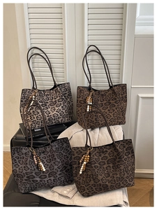 Collection of stylish leopard print tote bags with beaded tassels and long shoulder straps