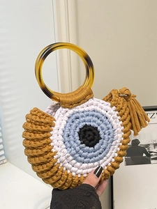 Handmade crochet Evil Eye handbag with amber resin handle and decorative tassel