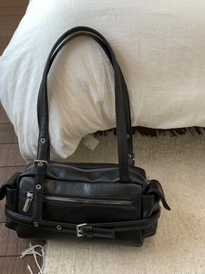 Retro black faux leather shoulder bag with silver zippers and belt buckles decoration