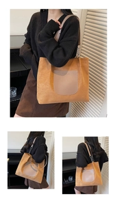 Close-up of brown suede tote bag featuring a leather front pocket and metal chain strap