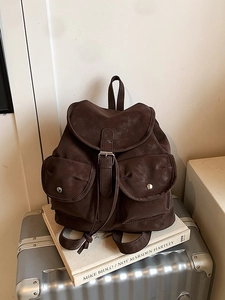 Retro dark brown large capacity backpack on travel suitcase with vintage matte finish
