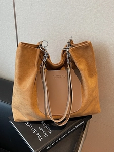 Large camel suede tote bag with leather pocket and chain strap for casual commuting
