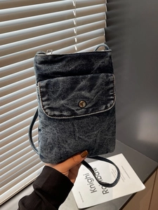 Fashionable dark blue denim crossbody cell phone bag with metal snap button and zipper