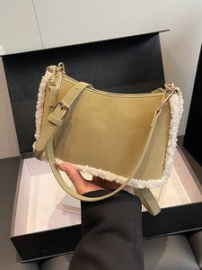 Olive green shoulder bag with plush fleece trim and adjustable strap for women