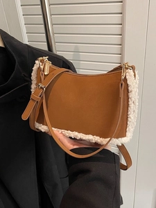 Vintage brown leather shoulder bag with white fleece trim and gold hardware accents