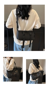 Detail view of black waterproof nylon crossbody bag with dual buckles and adjustable strap