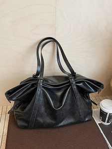 Vintage large black faux leather tote bag with adjustable straps for women commuting