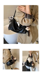 Detail of black soft leather hobo bag with teddy bear pendant shown in three angles