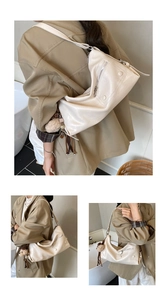 Detail of a creamy beige pleated PU leather crossbody bag with cute brown bear charm