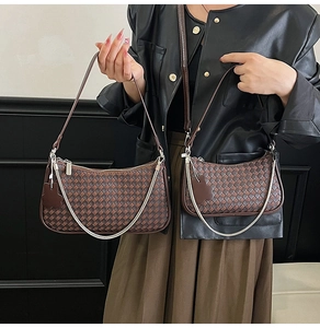 Detailed comparison of two brown woven crescent shoulder bags in different sizes