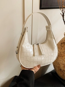 Chic cream crocodile pattern hobo bag with sleek double zipper design and top handle