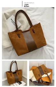 Detail of light brown tote bag with leather weaving and mixed matte finish textures