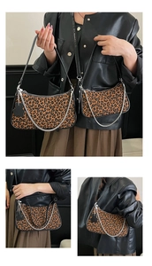 Detailed comparison of two sizes for leopard print crescent underarm bags with bear charm
