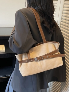 Retro beige suede tote bag with brown leather straps and metal buckle details