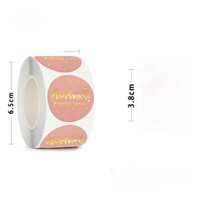 Pink gold-foiled Handmade with Love 3.8cm circular stickers on a roll with 500 labels